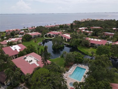 Welcome to Your Lakeside Paradise at 6472 Seagull Terrace #301 on IMG Academies Golf and Country Club in Florida - for sale on GolfHomes.com, golf home, golf lot