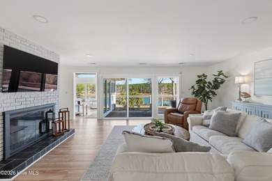 Tucked along a peaceful deep-water canal in the sought-after on Olde Point Golf and Country Club in North Carolina - for sale on GolfHomes.com, golf home, golf lot