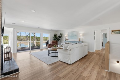 Tucked along a peaceful deep-water canal in the sought-after on Olde Point Golf and Country Club in North Carolina - for sale on GolfHomes.com, golf home, golf lot