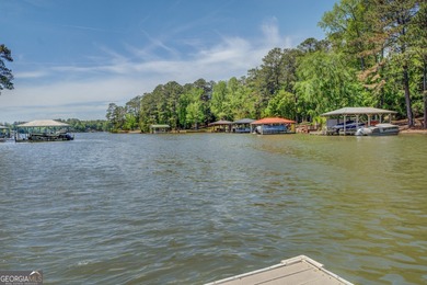 Welcome to this beautifully renovated lakefront home located in on Turtle Cove Golf Course in Georgia - for sale on GolfHomes.com, golf home, golf lot
