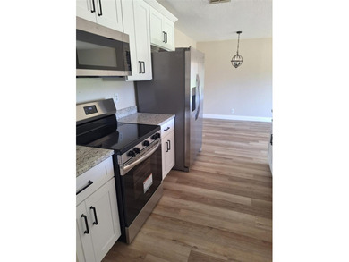 Welcome home for the holidays! Newly renovated Kitchen on Highland Lakes Executive Golf Course in Florida - for sale on GolfHomes.com, golf home, golf lot