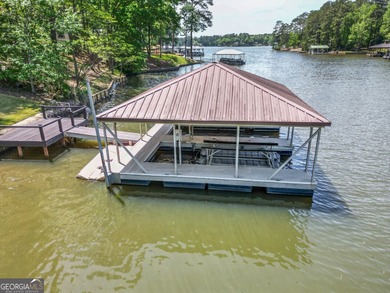 Welcome to this beautifully renovated lakefront home located in on Turtle Cove Golf Course in Georgia - for sale on GolfHomes.com, golf home, golf lot