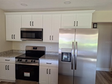 Welcome home for the holidays! Newly renovated Kitchen on Highland Lakes Executive Golf Course in Florida - for sale on GolfHomes.com, golf home, golf lot