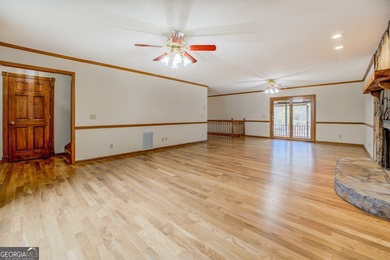 Welcome to this beautifully renovated lakefront home located in on Turtle Cove Golf Course in Georgia - for sale on GolfHomes.com, golf home, golf lot