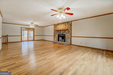 Welcome to this beautifully renovated lakefront home located in on Turtle Cove Golf Course in Georgia - for sale on GolfHomes.com, golf home, golf lot