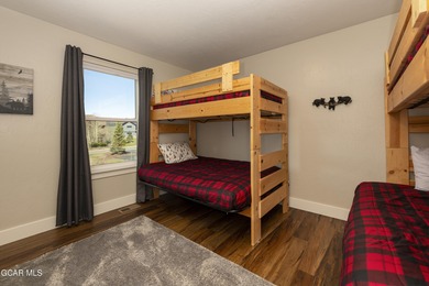 This stunning 4-bed, 3-bath mountain retreat combines luxury on Grand Elk Ranch and Club in Colorado - for sale on GolfHomes.com, golf home, golf lot