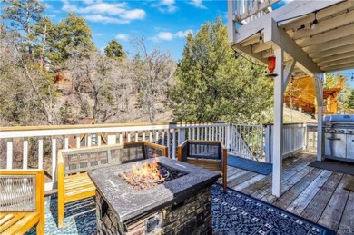 Desirable Moonridge location with outstanding ski slope views: on Big Bear Mountain Ski and Golf Resort in California - for sale on GolfHomes.com, golf home, golf lot