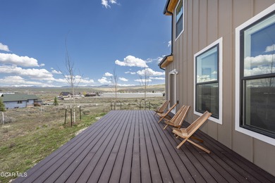 This stunning 4-bed, 3-bath mountain retreat combines luxury on Grand Elk Ranch and Club in Colorado - for sale on GolfHomes.com, golf home, golf lot