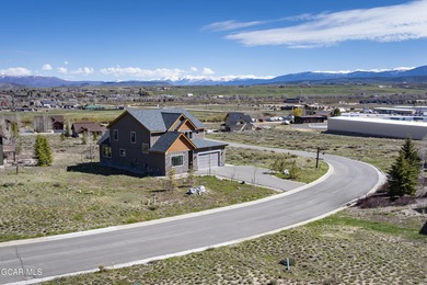 This stunning 4-bed, 3-bath mountain retreat combines luxury on Grand Elk Ranch and Club in Colorado - for sale on GolfHomes.com, golf home, golf lot