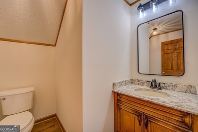 Welcome to this beautifully renovated lakefront home located in on Turtle Cove Golf Course in Georgia - for sale on GolfHomes.com, golf home, golf lot