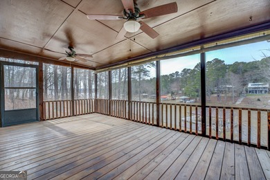 Welcome to this beautifully renovated lakefront home located in on Turtle Cove Golf Course in Georgia - for sale on GolfHomes.com, golf home, golf lot