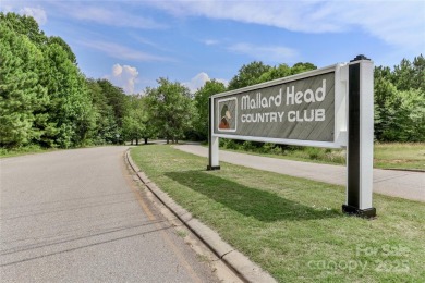 Discover the perfect blend of elegance and comfort in this on Mallard Head Country Club in North Carolina - for sale on GolfHomes.com, golf home, golf lot