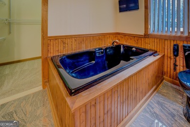 Welcome to this beautifully renovated lakefront home located in on Turtle Cove Golf Course in Georgia - for sale on GolfHomes.com, golf home, golf lot