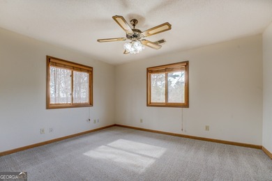 Welcome to this beautifully renovated lakefront home located in on Turtle Cove Golf Course in Georgia - for sale on GolfHomes.com, golf home, golf lot