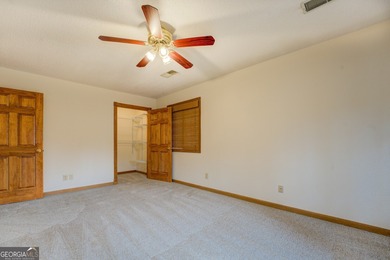 Welcome to this beautifully renovated lakefront home located in on Turtle Cove Golf Course in Georgia - for sale on GolfHomes.com, golf home, golf lot