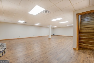 Welcome to this beautifully renovated lakefront home located in on Turtle Cove Golf Course in Georgia - for sale on GolfHomes.com, golf home, golf lot