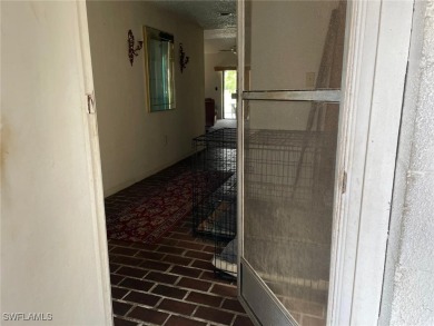 Opportunity Knocks! This 2BR/2BA single-story home in San Carlos on San Carlos Golf Club in Florida - for sale on GolfHomes.com, golf home, golf lot