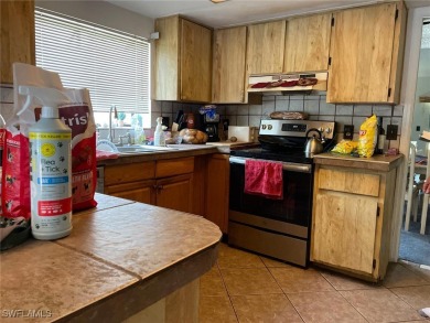 Opportunity Knocks! This 2BR/2BA single-story home in San Carlos on San Carlos Golf Club in Florida - for sale on GolfHomes.com, golf home, golf lot