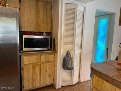 Opportunity Knocks! This 2BR/2BA single-story home in San Carlos on San Carlos Golf Club in Florida - for sale on GolfHomes.com, golf home, golf lot