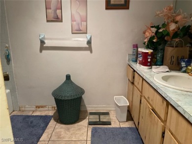 Opportunity Knocks! This 2BR/2BA single-story home in San Carlos on San Carlos Golf Club in Florida - for sale on GolfHomes.com, golf home, golf lot