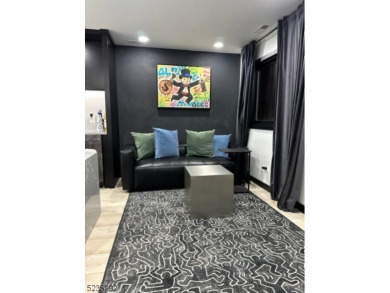 This completely renovated multi-floor unit condo features a on Minerals Golf Club in New Jersey - for sale on GolfHomes.com, golf home, golf lot