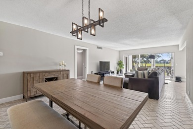 Price-to-sell corner condo in Fountains of Palm Beach! This on Fountains Golf and Country Club in Florida - for sale on GolfHomes.com, golf home, golf lot