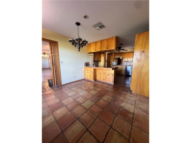 Spacious 2 story home has a great view of the local Municipal on Alice Municipal Golf Course in Texas - for sale on GolfHomes.com, golf home, golf lot