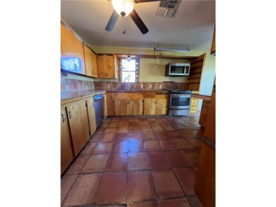 Spacious 2 story home has a great view of the local Municipal on Alice Municipal Golf Course in Texas - for sale on GolfHomes.com, golf home, golf lot