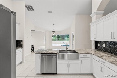 Step into luxury with this stunning 3-bedroom, 2.5-bath home on LakeSide Country Club in Florida - for sale on GolfHomes.com, golf home, golf lot