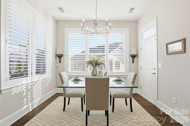 Experience elegant, low-maintenance living in the coveted on The Palisades Country Club in North Carolina - for sale on GolfHomes.com, golf home, golf lot