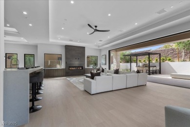 New custom estate home positioned eloquently inside the on Southern Highlands Golf Club in Nevada - for sale on GolfHomes.com, golf home, golf lot
