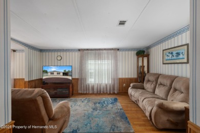 Step into this beautifully maintained 4-bedroom, 2-bathroom home on High Point Golf Club, Inc. in Florida - for sale on GolfHomes.com, golf home, golf lot