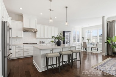 Experience elegant, low-maintenance living in the coveted on The Palisades Country Club in North Carolina - for sale on GolfHomes.com, golf home, golf lot