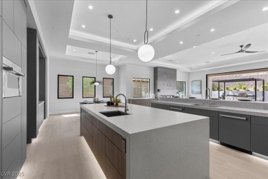 New custom estate home positioned eloquently inside the on Southern Highlands Golf Club in Nevada - for sale on GolfHomes.com, golf home, golf lot
