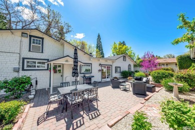This charming cottage on .38 of an acre sits on an iconic street on Washoe County Golf Club in Nevada - for sale on GolfHomes.com, golf home, golf lot
