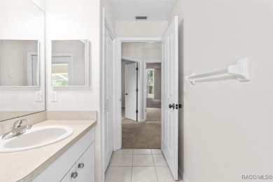 Step into luxury with this stunning 3-bedroom, 2.5-bath home on LakeSide Country Club in Florida - for sale on GolfHomes.com, golf home, golf lot