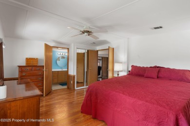 Step into this beautifully maintained 4-bedroom, 2-bathroom home on High Point Golf Club, Inc. in Florida - for sale on GolfHomes.com, golf home, golf lot