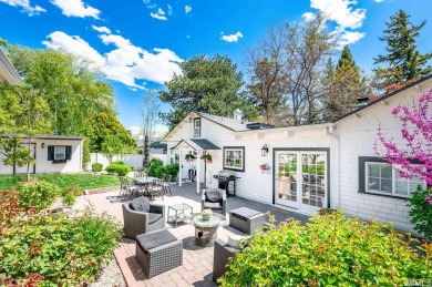 This charming cottage on .38 of an acre sits on an iconic street on Washoe County Golf Club in Nevada - for sale on GolfHomes.com, golf home, golf lot
