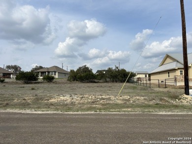 This is a great .25 acre lot with a partial lake view of the on Vaaler Creek Golf Club in Texas - for sale on GolfHomes.com, golf home, golf lot