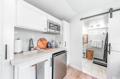 This charming cottage on .38 of an acre sits on an iconic street on Washoe County Golf Club in Nevada - for sale on GolfHomes.com, golf home, golf lot