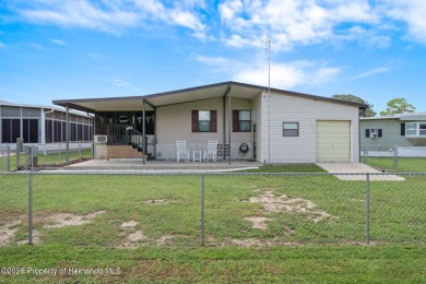 Step into this beautifully maintained 4-bedroom, 2-bathroom home on High Point Golf Club, Inc. in Florida - for sale on GolfHomes.com, golf home, golf lot