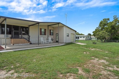 Step into this beautifully maintained 4-bedroom, 2-bathroom home on High Point Golf Club, Inc. in Florida - for sale on GolfHomes.com, golf home, golf lot