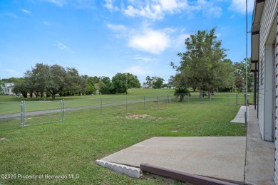 Step into this beautifully maintained 4-bedroom, 2-bathroom home on High Point Golf Club, Inc. in Florida - for sale on GolfHomes.com, golf home, golf lot