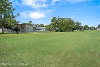 Step into this beautifully maintained 4-bedroom, 2-bathroom home on High Point Golf Club, Inc. in Florida - for sale on GolfHomes.com, golf home, golf lot