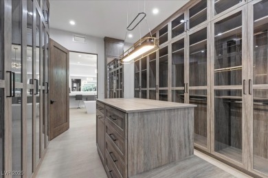 New custom estate home positioned eloquently inside the on Southern Highlands Golf Club in Nevada - for sale on GolfHomes.com, golf home, golf lot