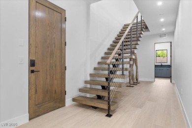 New custom estate home positioned eloquently inside the on Southern Highlands Golf Club in Nevada - for sale on GolfHomes.com, golf home, golf lot