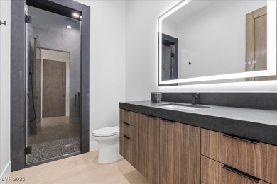 New custom estate home positioned eloquently inside the on Southern Highlands Golf Club in Nevada - for sale on GolfHomes.com, golf home, golf lot