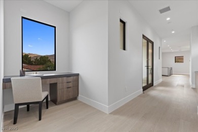 New custom estate home positioned eloquently inside the on Southern Highlands Golf Club in Nevada - for sale on GolfHomes.com, golf home, golf lot