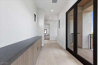 New custom estate home positioned eloquently inside the on Southern Highlands Golf Club in Nevada - for sale on GolfHomes.com, golf home, golf lot