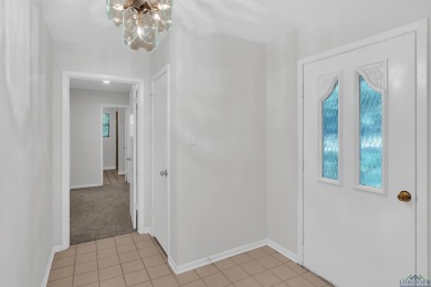 Freshly updated and move-in ready! This 3-bed, 2-bath home in on Hide-A-Way Lake Golf Course in Texas - for sale on GolfHomes.com, golf home, golf lot
